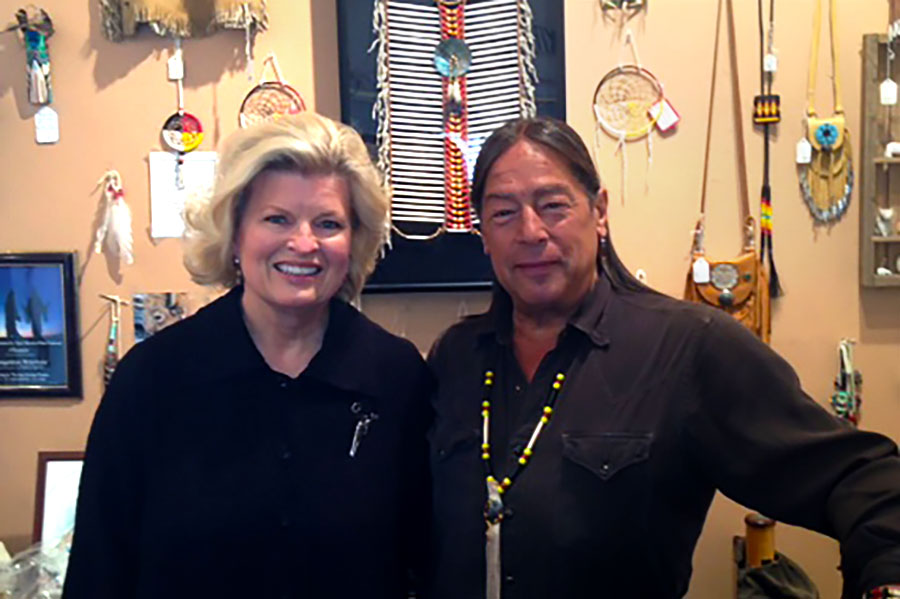 Sonnee with musician, Sky Redhawk in his shop, Native Sounds, Santa Fe, NM, 2014. It is Sky’s music that can be heard on this website